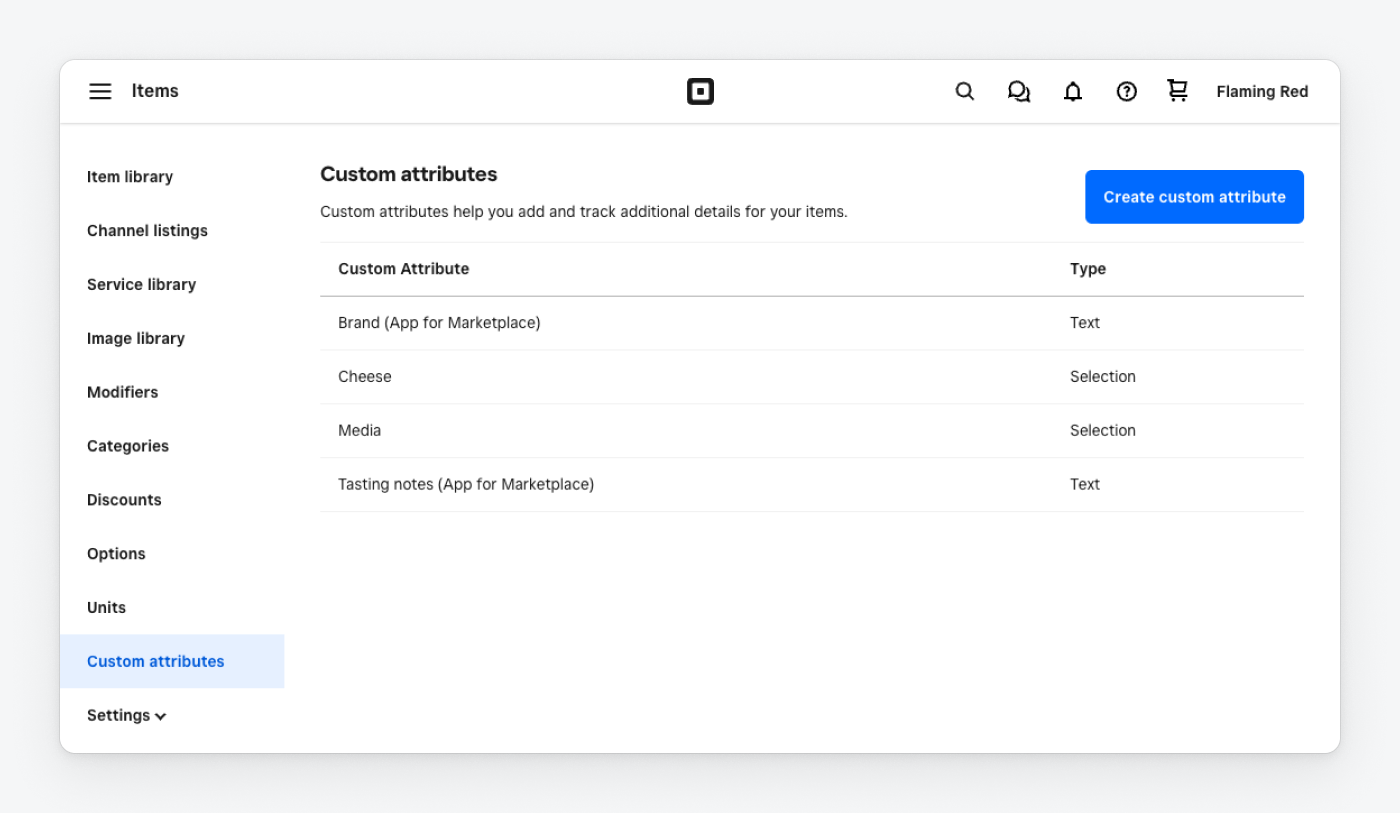 A screenshot of the Square Dashboard item library custom attributes list.